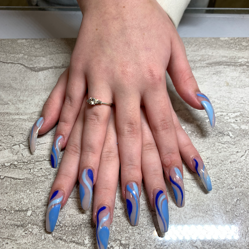Blue swirl nail art