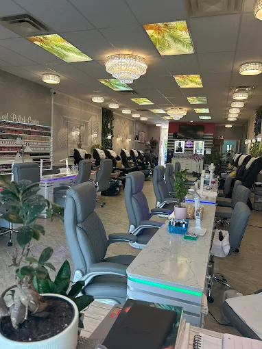MY Nails & Spa interior in Post Falls, Idaho showing manicure stations, pedicure chairs, and crystal chandeliers
